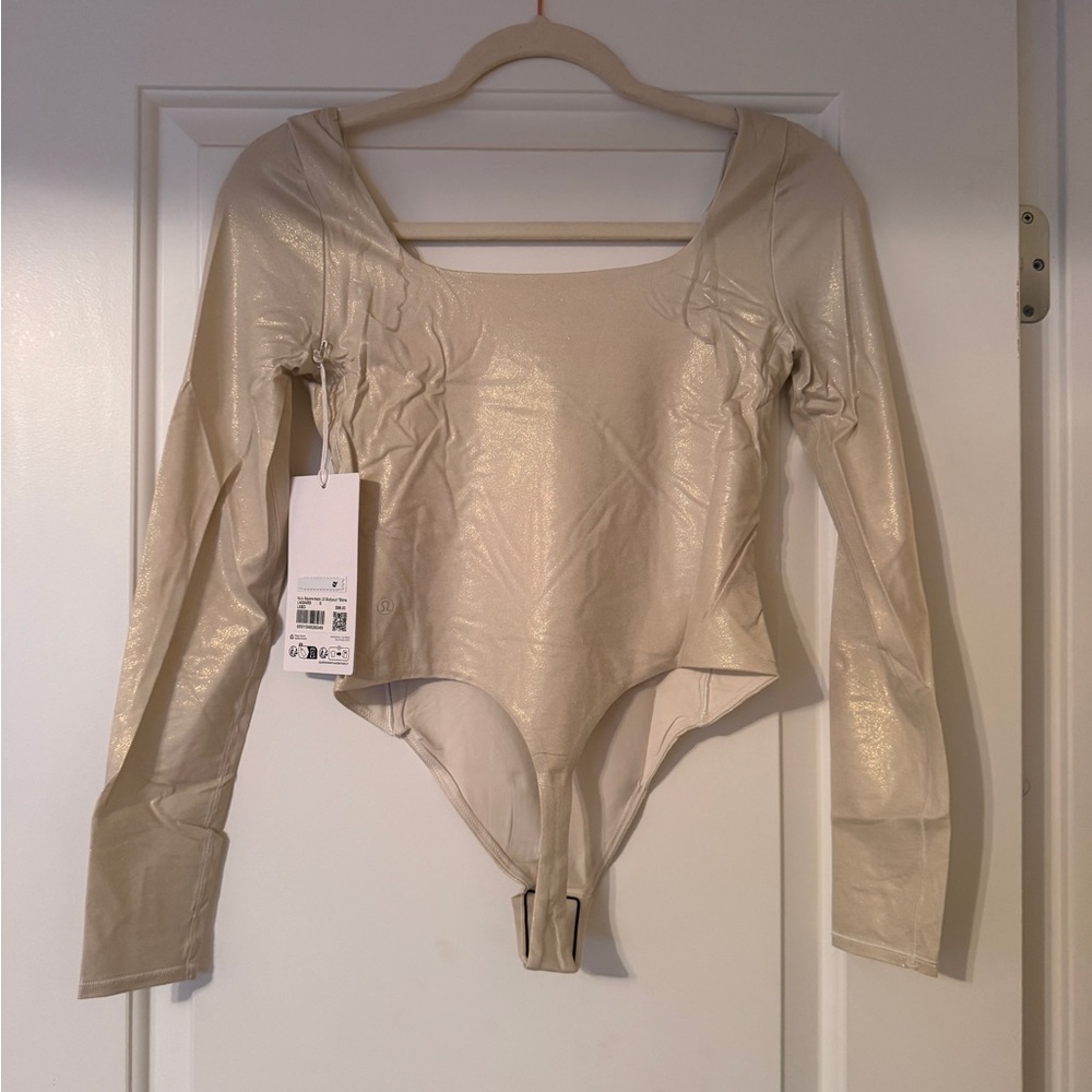 Wundermost Ultra-Soft Nulu Square-Neck Long-Sleeve Bodysuit
Shine Size S - Picture 8 of 9